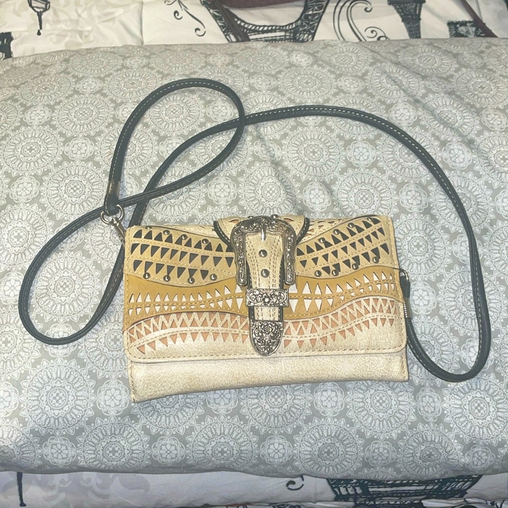 Crossbody wallet w/ external rhinestones & plenty of compartments on the inside!